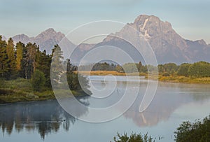 Morning reflections on Snake River, Teton National Park, Wyoming