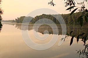 Morning on the river. Fog and evaporation over water.