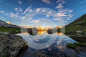 Morning shot of the Matterhorn Monte Cervino, Mont Cervin pyramid and Stellisee lake.