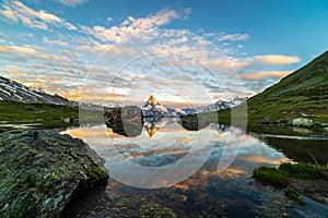 Morning shot of the Matterhorn Monte Cervino, Mont Cervin pyramid and Stellisee lake.