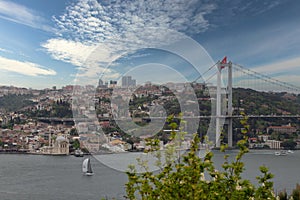 Morning shot of Istanbul city from Fethi Pasha Grove overlooking Bosphorus Bridge, or Bogazici Koprusu, Istanbul, Turkey photo