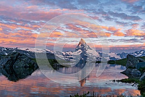 Morning shot of the Matterhorn Monte Cervino, Mont Cervin pyramid and Stellisee lake.