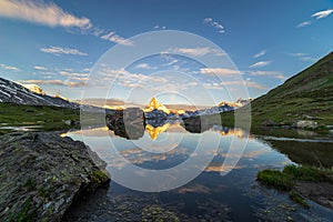 Morning shot of the Matterhorn Monte Cervino, Mont Cervin pyramid and Stellisee lake.