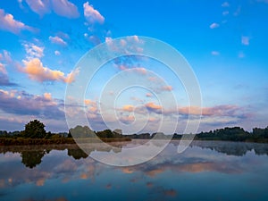 Morning sky with clouds over the river