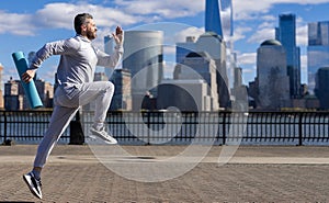 Morning sport workout jogger run in New York. The jogger run at sport training. Sportsman jogger running or jogging. Man