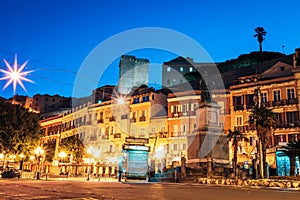 Morning streets with lanterns and cafes in Cagliari Italy