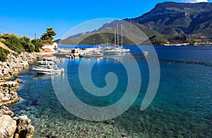 Morning summer view of the bay with yachts, boats near greek village Kiparissi, Lakonia.