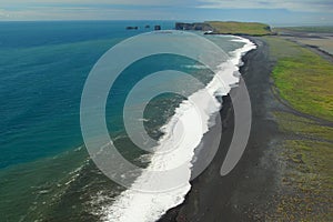 Morning summer walk from the town of Vic to the black Reinisfjara beach