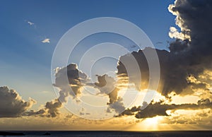 Morning sun with clouds and god rays