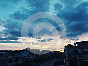 The morning sun gilds the sky.