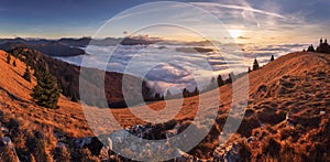 Morning sun panorama, beautiful fluffy clouds and forest at mount Lysec in Slovakia