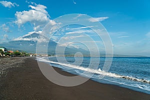 Morning sunny view on Agung volcano from the coast in Amed, Bali,  Indonesia photo