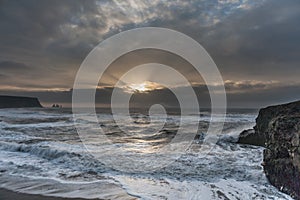 Morning Sunrise in Iceland Black Sand Beach With Ocean Water Waves and Stormy Clouds. Vik Vikurbraut