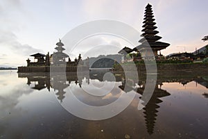 Morning sunrise over the Beratan Lake with Ulun Danu temple and its water reflection, Bali, Indonesia