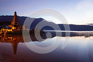 Morning sunrise over the Beratan Lake with Ulun Danu temple and its water reflection, Bali, Indonesia