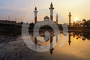 Morning sunrise sky of Masjid Bukit Jelutong in Shah Alam near Kuala lumpur, Malaysia. Also known as Mosque of Tengku Ampuan