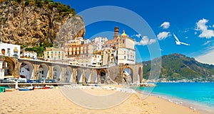 Morning view of Amalfi cityscape on coast line of mediterranean sea, Italy