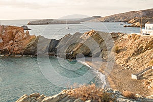 Morning view of the bay with a rocky shore