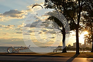 Morning view of Cleveland skyline, Lake Erie, and paraglider