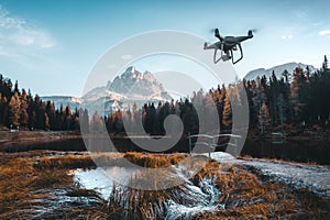 Morning drone view of Lago Antorno, Dolomites, Lake mountain landscape with Alps peak , Misurina, Cortina d`Ampezzo, Italy