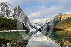 Morning view of Lake Louise with Rocky mountain reflection in the Banff National Park, Alberta, Canada