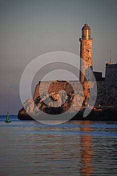 Morning view of the lighthouse at the entrance to the harbor of Havana, Cuba