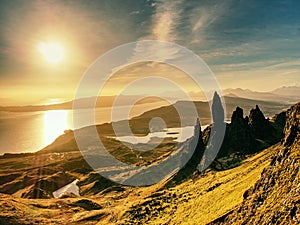 Morning view of Old Man of Storr rocks formation and lake Scotland