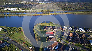 Morning view Regatta Waters On The lake and Parkland Gold Coast Grass play area House Estate next to Coomera River On The lake,