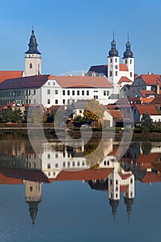 Morning view of Telc or Teltsch town mirroring in lake