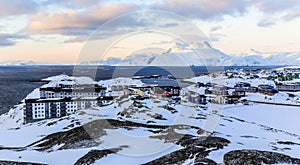 Morning view to the stones and distant streets of Nuuk city, wit