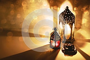 Moroccan Arabic lanterns, burning candles glowing at night. Date fruit on the table. Greeting card, invitation for