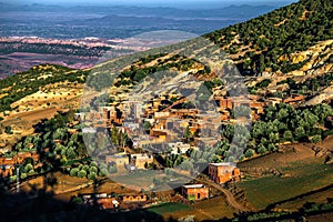 Moroccan berber village in atlas mountain countryside at sunrise