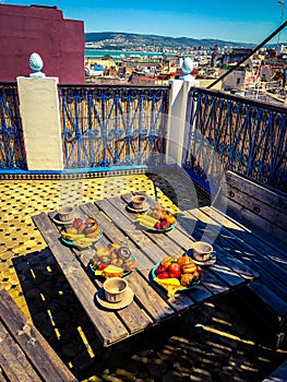 Moroccan breakfast on one of Tangier rooftops. Tangier is located in the north of Morocco