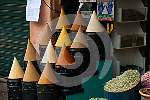 Moroccan colorful spice cones at a bazaar