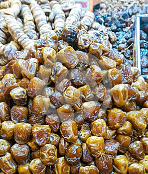 Moroccan Dates piled on a plate for selling.