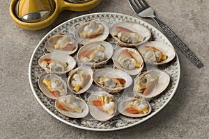 Moroccan dish with open cooked smooth clams