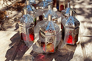 Moroccan glass and metal lanterns lamps in souq