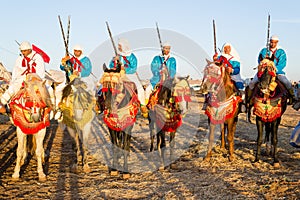 Moroccan horse riders during fantasia festival