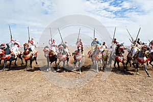 Moroccan horse riders in Fantasia performance