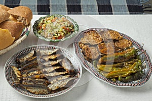 Moroccan meal with stuffed sardines and vegetables