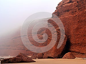 marsian-like mistic foggy landscape of clay rocks photo