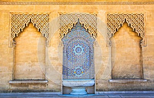 Moroccan style fountain with fine colorful mosaic tiles at the Mohammed V mausoleum in Rabat Morocco