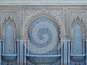 Moroccan style fountain with fine colorful mosaic tiles at the Mohammed V mausoleum in Rabat Morocco