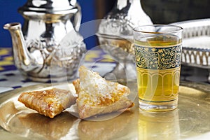 Moroccan sweet pastries with mint tea