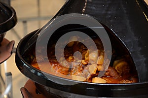 Moroccan tagine of lamb legs with onions. Traditional Moroccan Algerian Tunisian tagine