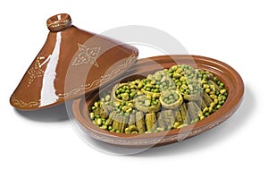 Moroccan tajine with Cardoon, stuffed artichoke hearts with green peas and broad beans photo