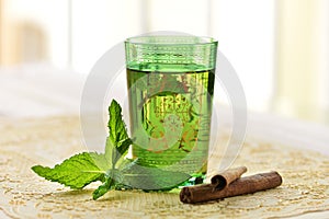 Moroccan tea with mint leaves and cinnamon.