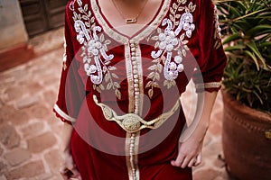 Moroccan traditional dress, embroidery on the caftan photo