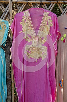Moroccan traditional pink woman dress closeup in Morocco