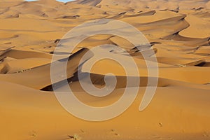 Morocco. Beautiful sunset in the Sahara desert. Sand dunes at su